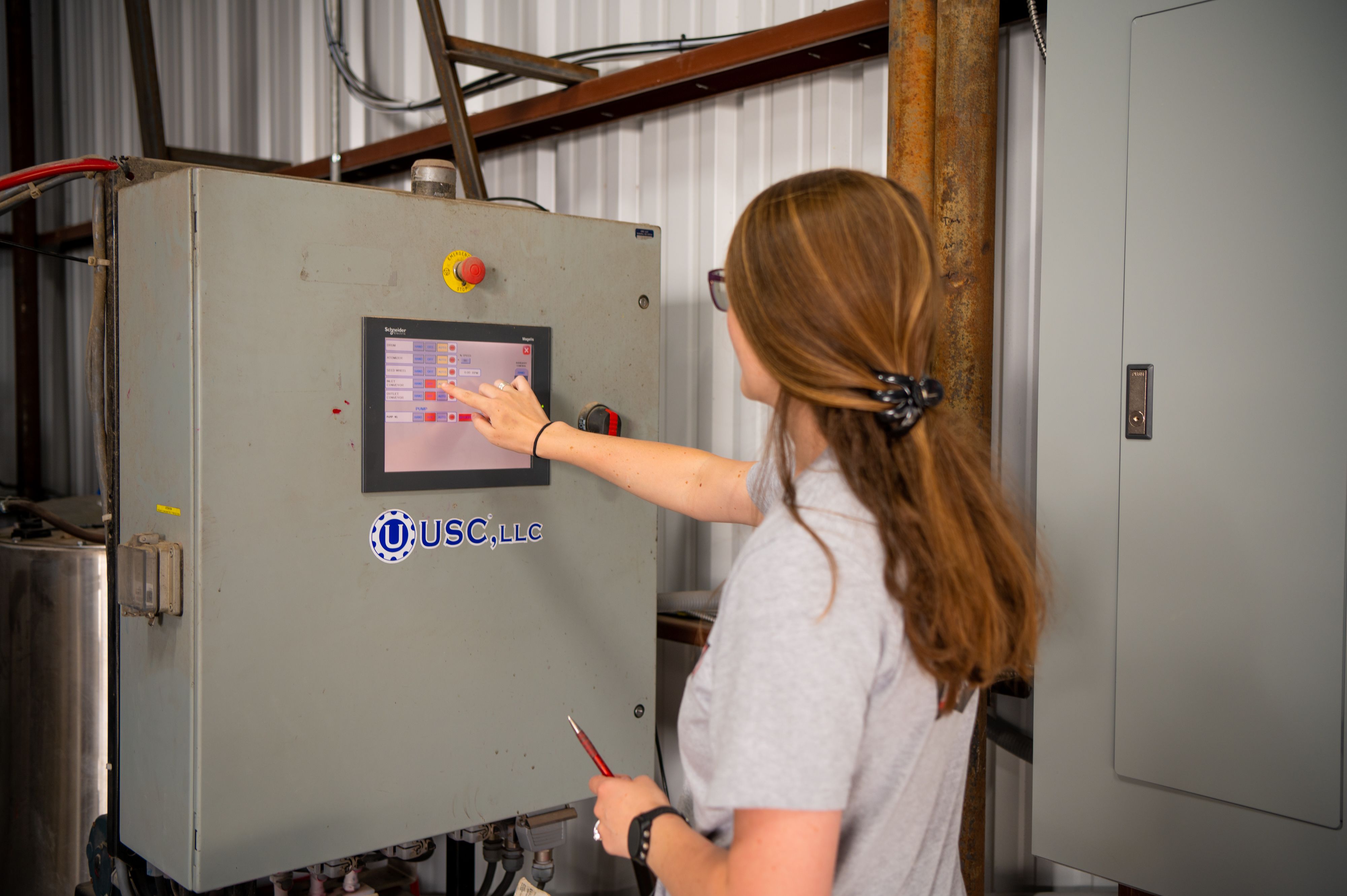 Young girl using a touch screen device.